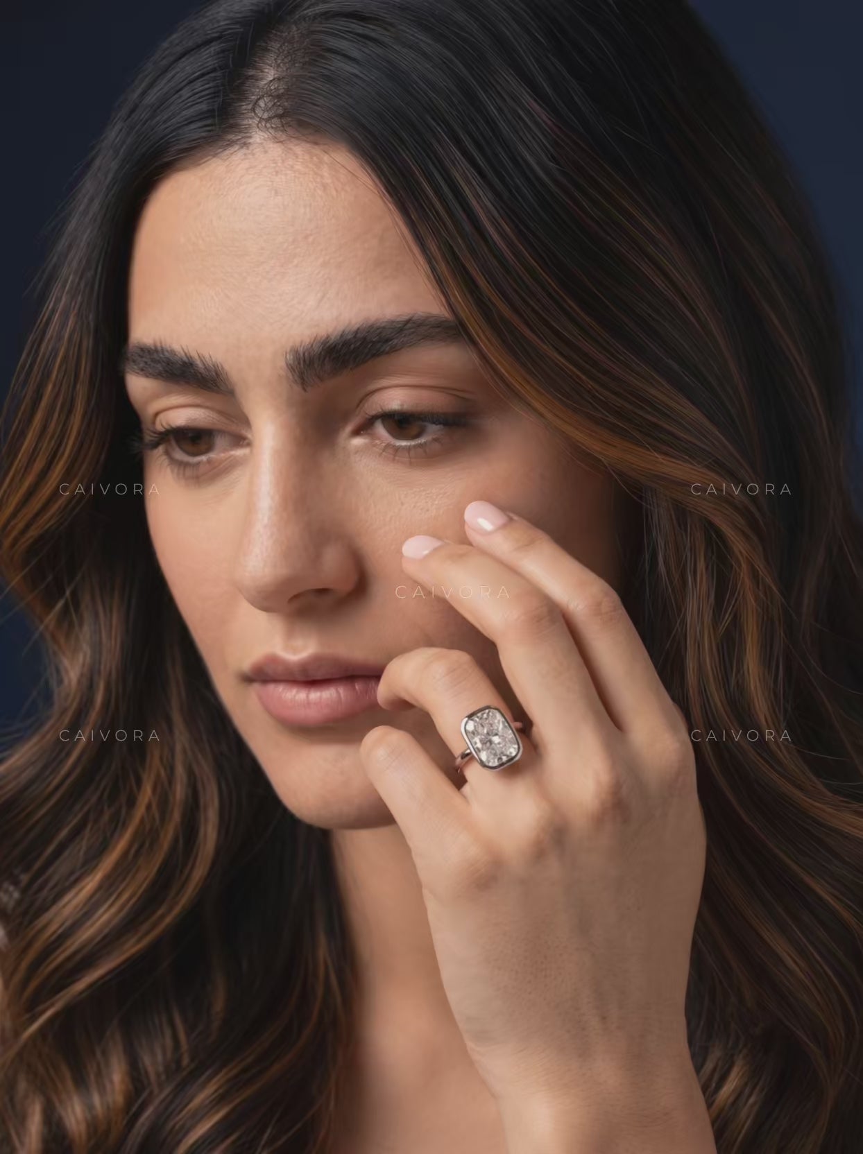 Sculpted Grace with an Elongated Cushion Cut Center