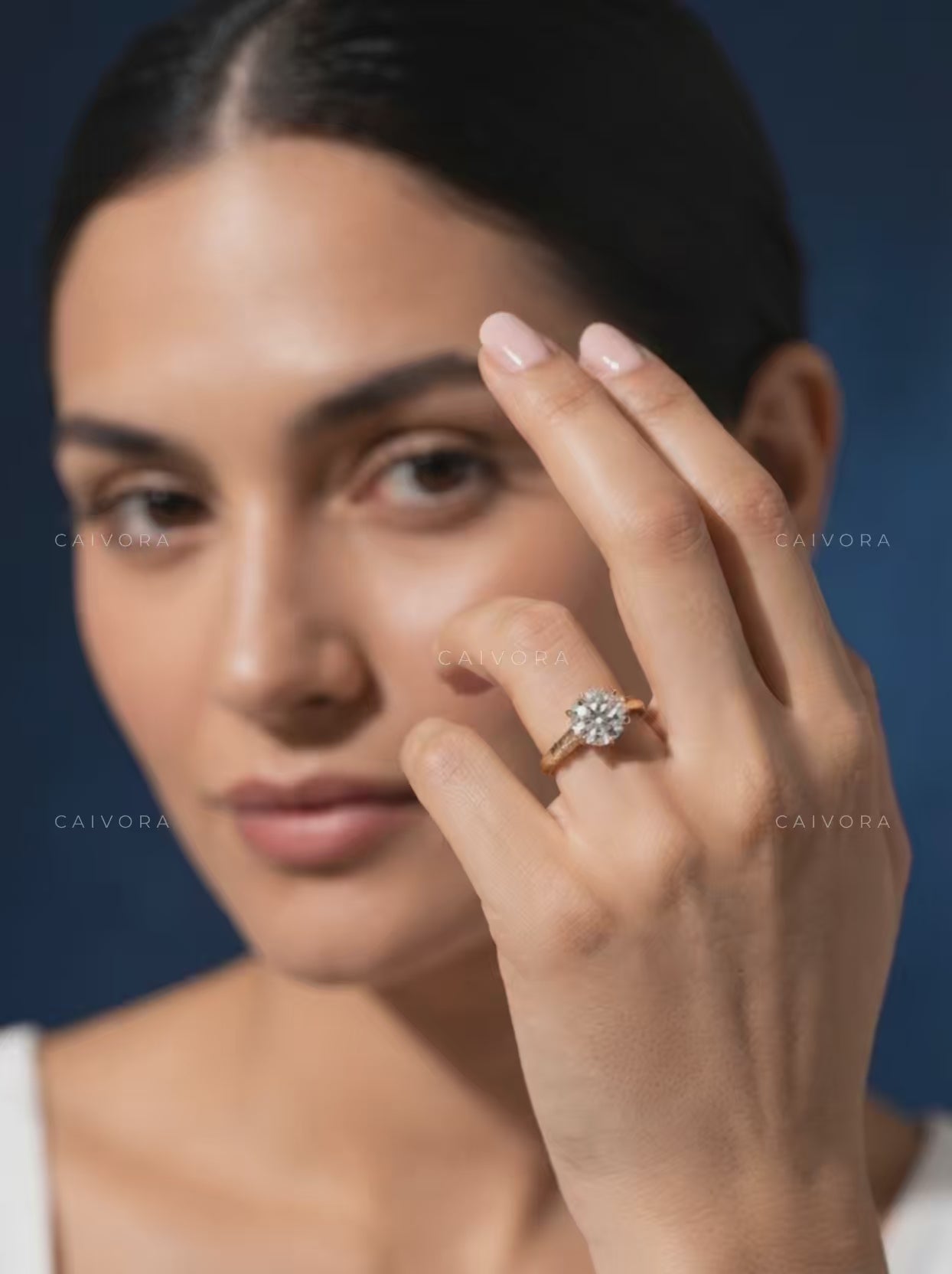 Elegant Tapered Cathedral Engagement Ring Featuring a Round Cut Diamond