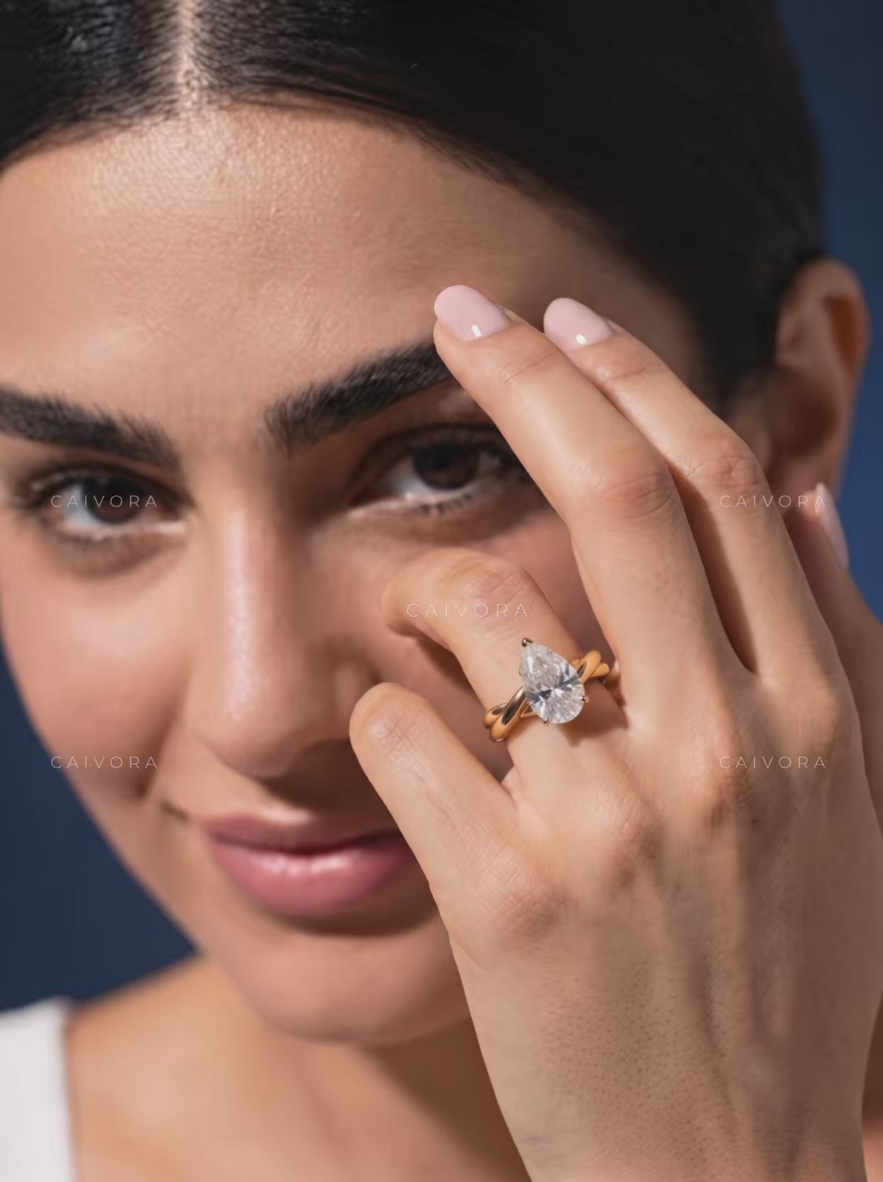 Petal Radiance Kosina Engagement Ring with a Pear Cut Diamond