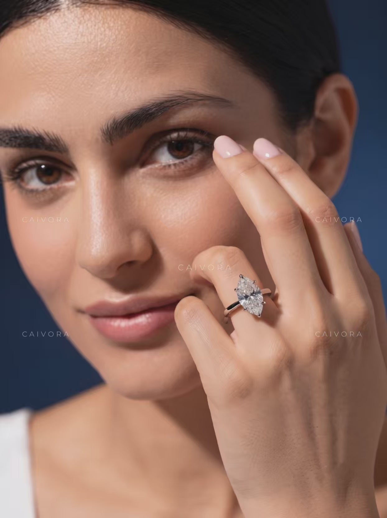 Distinctive Tapered Cathedral Engagement Ring with a Marquise Cut Diamond