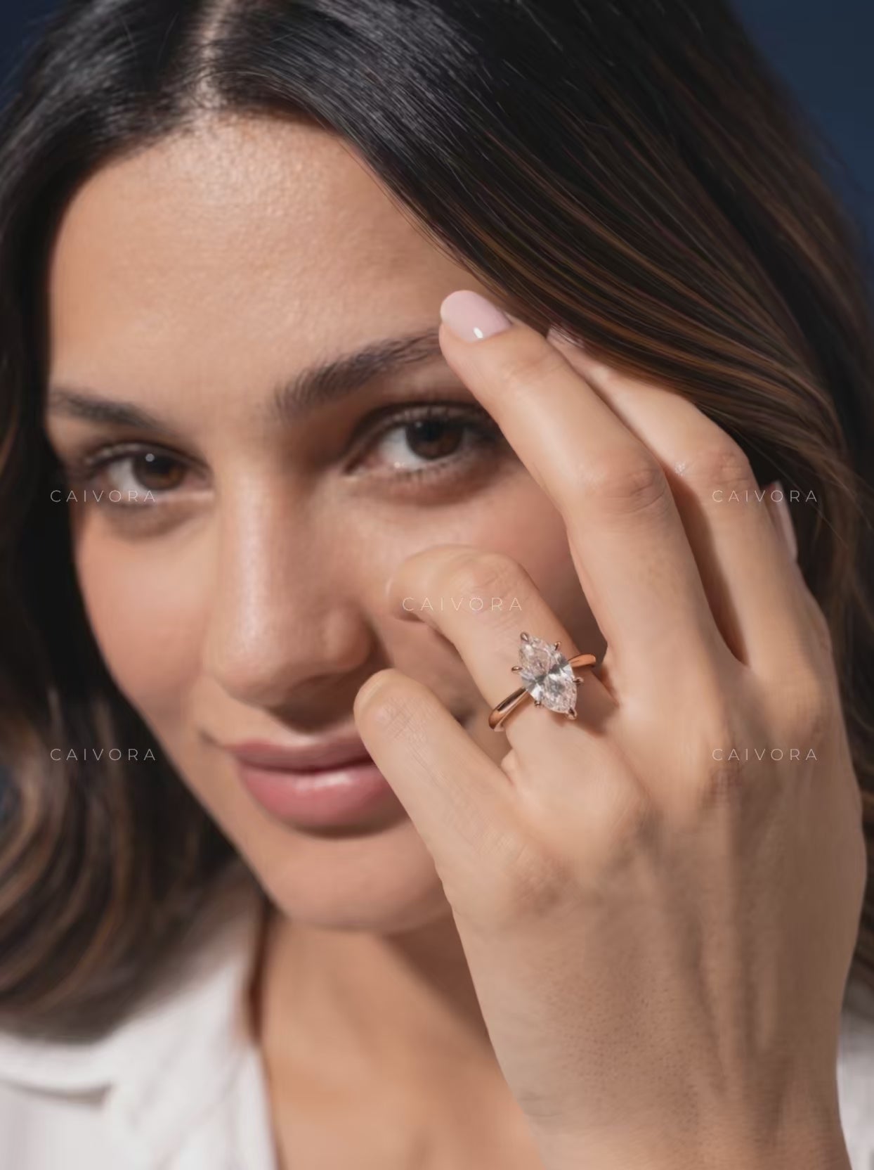 Graceful Tapered Cathedral Engagement Ring with an Oval Cut Center